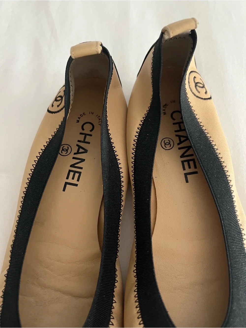 CHANEL Beige Leather Ballet Flats with Black Cap Toe